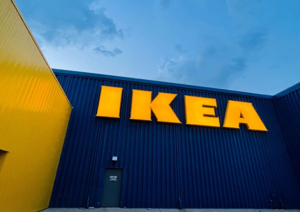 'IKEA' written in yellow on blue wall.